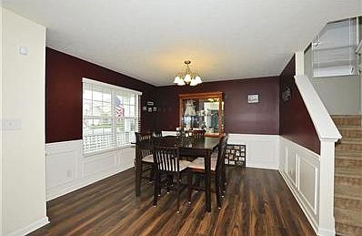 Dining room ready for all your parties and holidays! Gorgeous Wainscoting detail