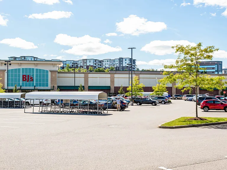 Conveniently close to retailers, including the shops at Crown Colony Drive.