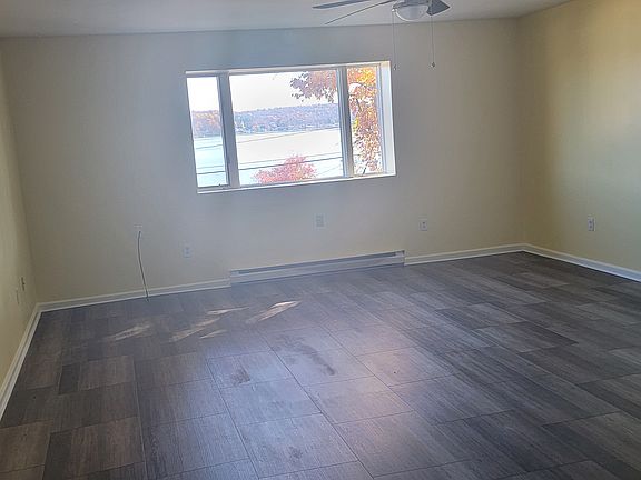 Living room with kitchen on the left