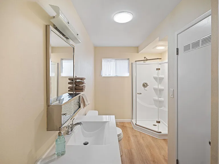 Hall Bathroom features shower and skylight