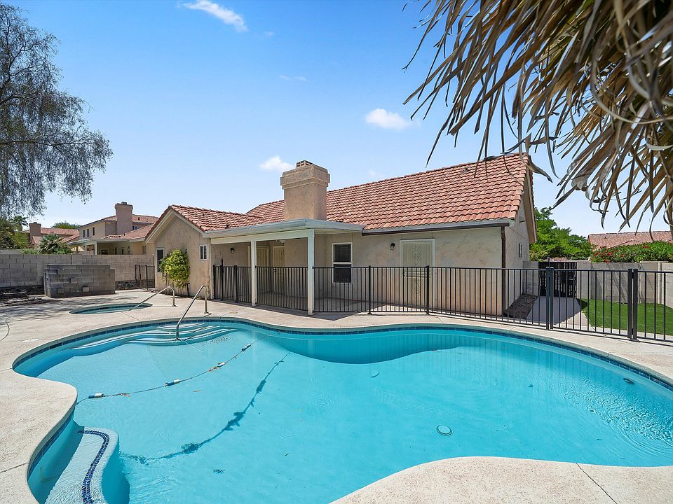 Stunning backyard with pool, spa and covered patio with turf area! Mountain views!