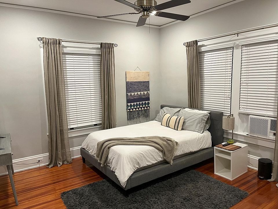 Large bedroom with queen bed and good-sized closet