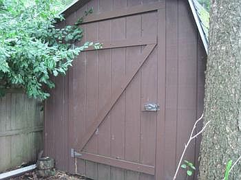 A convenient storage shed holds water toys and accessories, not to mention fishing equipment!