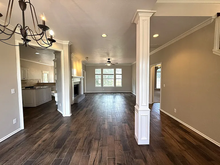 Living room and dining room for smooth flow for family gatherings.