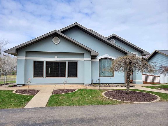 Flowering trees in front of home