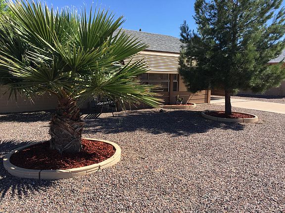 Front house beautifully landscaped