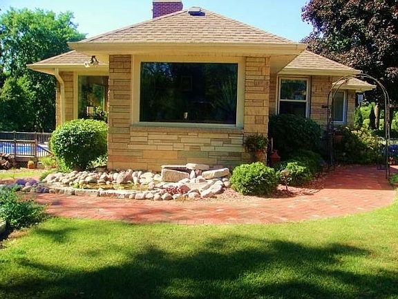 South side of home with brick walkway!