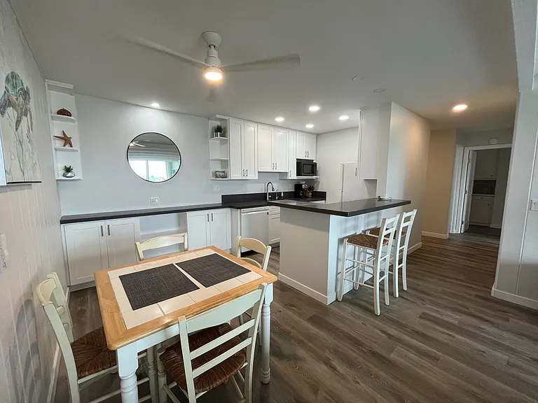 dining area and bar, full kitchen, and beverage 'bar' area.