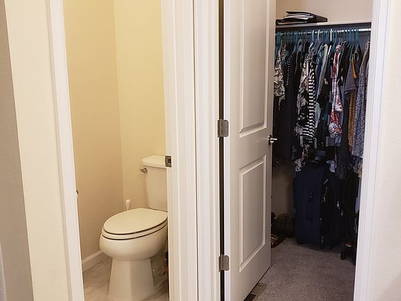 Master walk-in closet in the bathroom