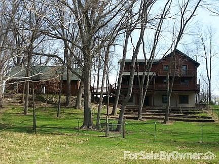 Rear view of house and garage