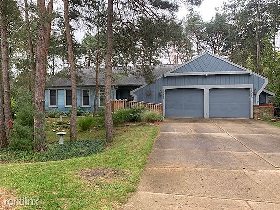 Beautiful wooded lot. One stall garage usage.
