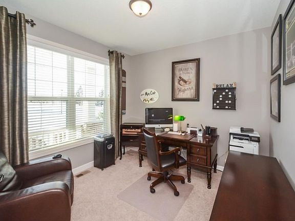 MAIN FLOOR OFFICE 11 X 10 WITH FRENCH DOORS AND VIEW OUT TO FRONT YARD/FRONT PORCH!