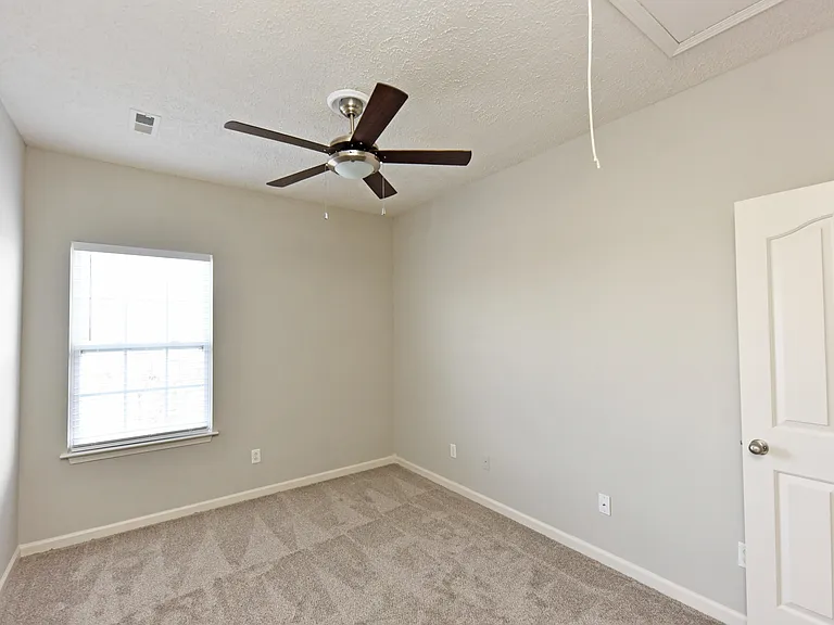 Cozy bedroom with carpet
