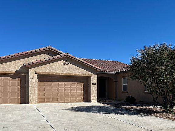 2400 sq ft. Four bedrooms. 2.5 bathrooms
Three car garage is fully insulated. Huge driveway