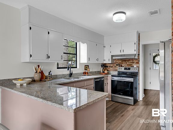 3rd image of 7268 Riverwood Dr E