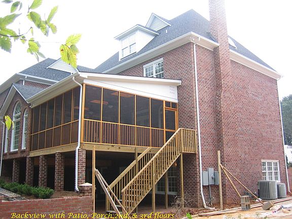 View of the rear. Basement, Main level, 2nd floor, & 3rd floor