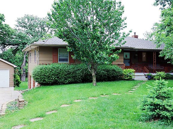 3 OVERSIZED garages.