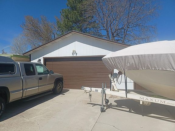 Large 2-car garage in rear