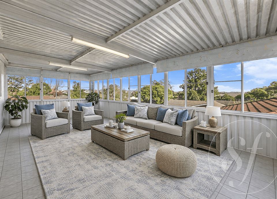 Sunroom / Enclosed Outdoor Living Area
"This beautifully styled enclosed sunroom and outdoor entertaining space is a true highlight of the property. Featuring floor-to-ceiling windows on all sides, the room is bathed in natural light while offering breath