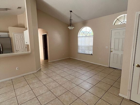 Facing front door and dining area