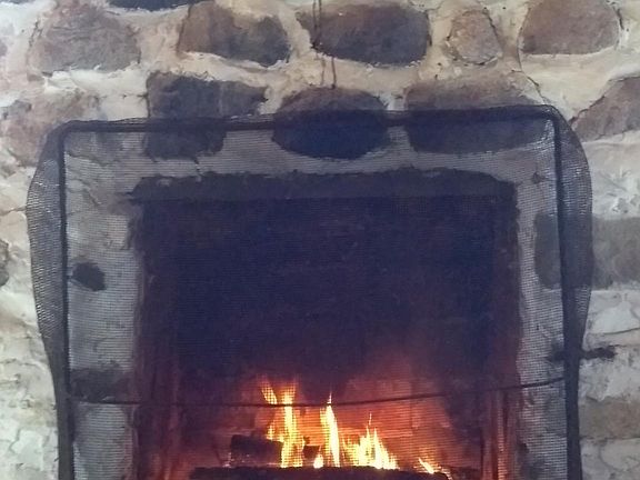 Hand built wood-burning fireplace