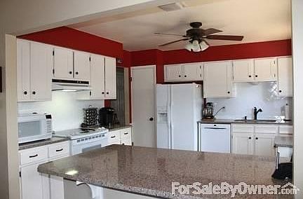 Kitchen 1
						:
						Quartz countertops and oil-rubbed bronze fixtures.