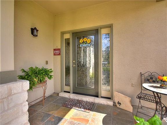 Leaded glass door entry and tile entry.