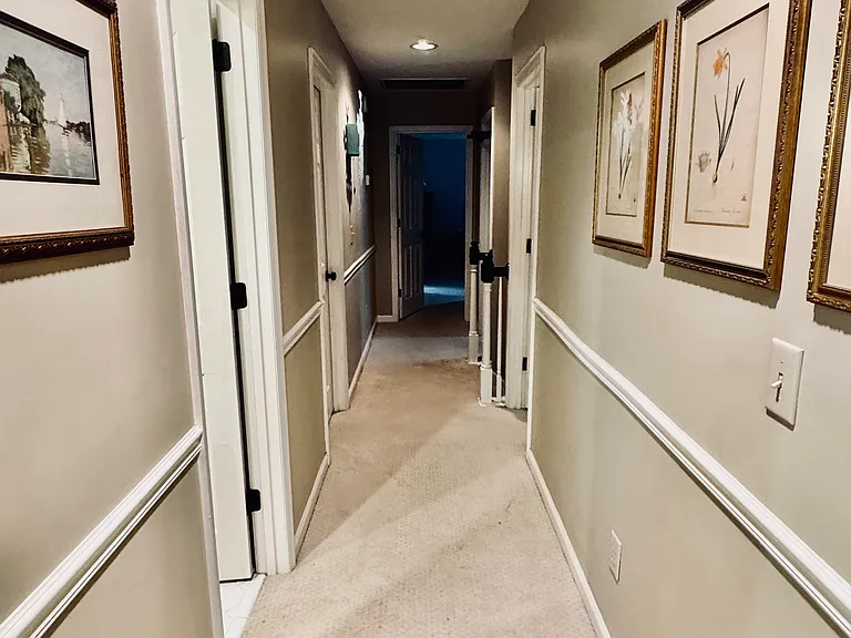 Hallway 
Doors on the left (Bathroom, Bedroom #2)
Doors on Right (Bedrooms #1, #3)
End of Hallway (Master Bedroom)