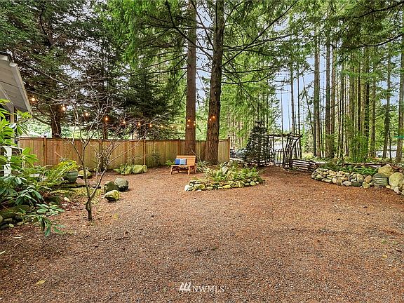 The front area of the house features low-maintenance native landscaping, and is fully fenced. 
