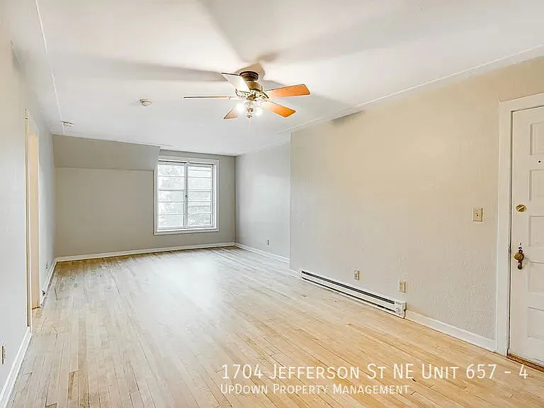 "Chic 2-Bed Retreat with Gleaming Hardwood Floors in the Heart of Minneapolis!" — Photo 3