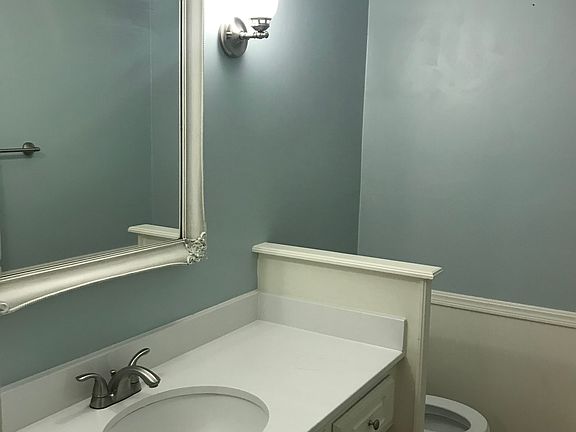 Large powder room off entry