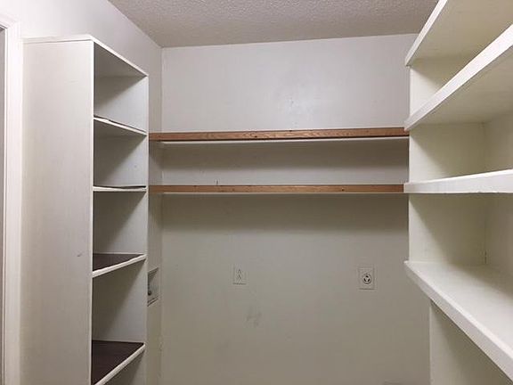Lots of Storage Space in Laundry Room Right Next to the Kitc