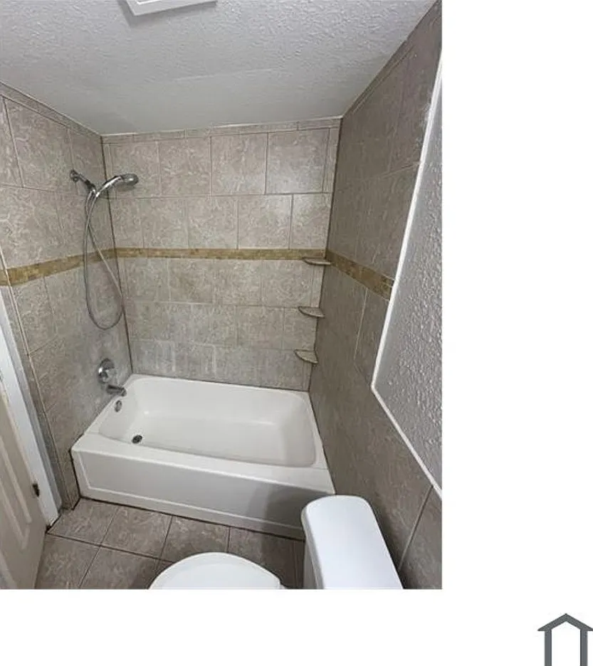 Discover your dream home in this beautifully renovated four-bedroom, two-bathroom house. — Photo 3