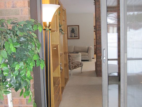 Den and entrance to porch