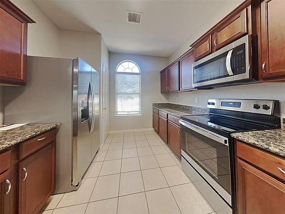 4th image of 6623 Poplar Rose Ct