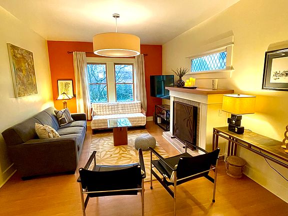 Living room with gas fireplace and HDTV