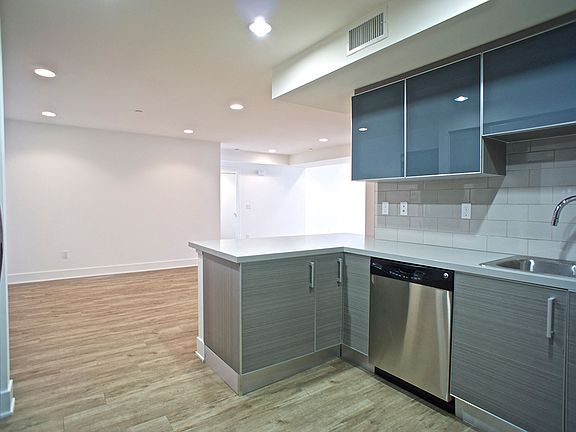 Open-Concept Kitchen, Dining, and Living Room Areas
