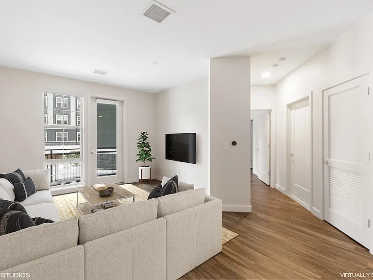 Open concept living space with Nest thermostat