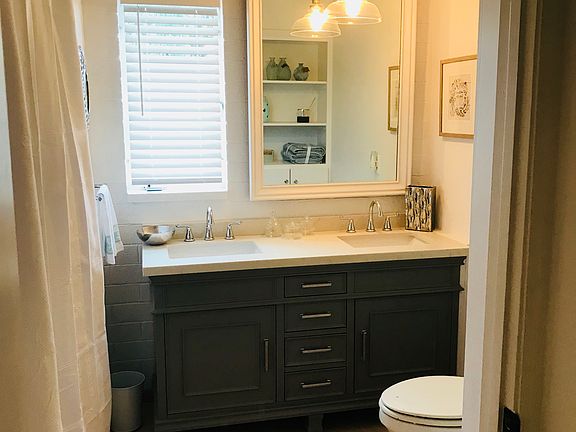 Grey vanity with 2 sinks