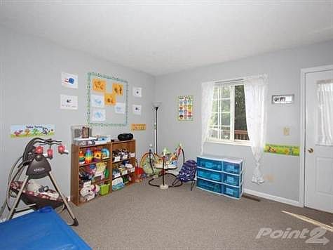 This is the dining room but currently the seller uses it as a class room. Great walk out to deck and would be great for those summer dinner parties where you want to grill outside and serve dinner in. The dining area flows into the breakfast room and Kitchen for that open feeling.