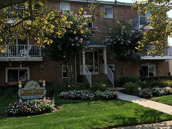 beautiful manicured building with security enterance system