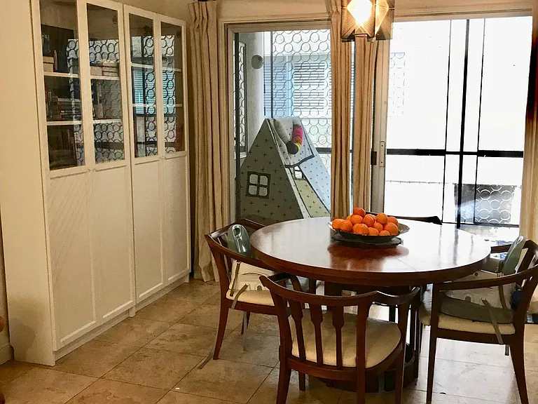 Dining room w/vintage lighting and custom linen curtains