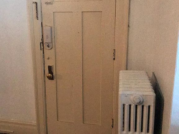 Front entry , steam radiant radiator, carpeted front room