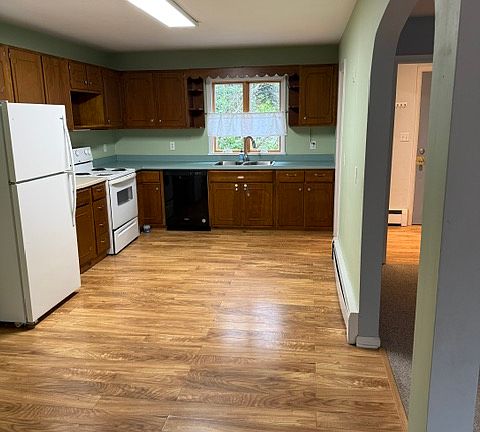 View to kitchen from edge of living room
