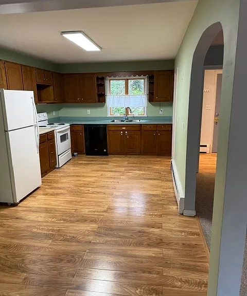 View to kitchen from edge of living room