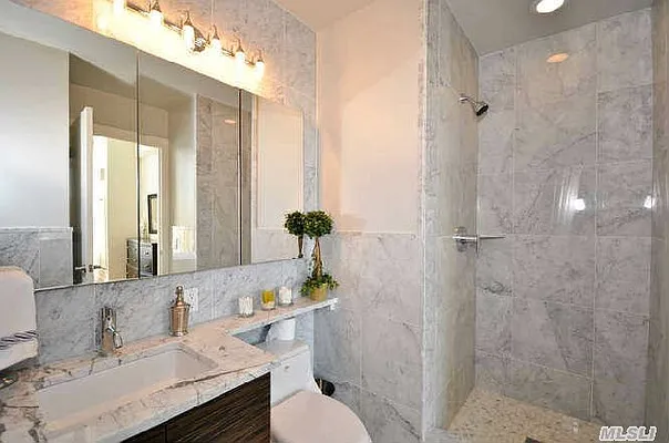 Sold by Douglas Elliman | media 13