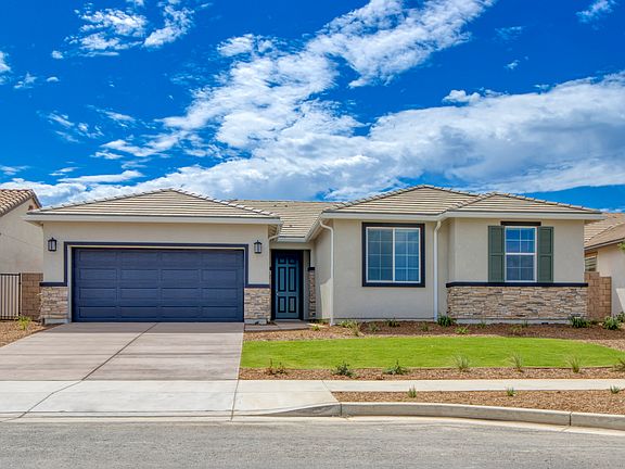 Enjoy front yard landscaping and solar panels included