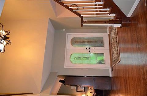 Gorgeous front doors w/palladium glass design welcomes you into the Foyer!