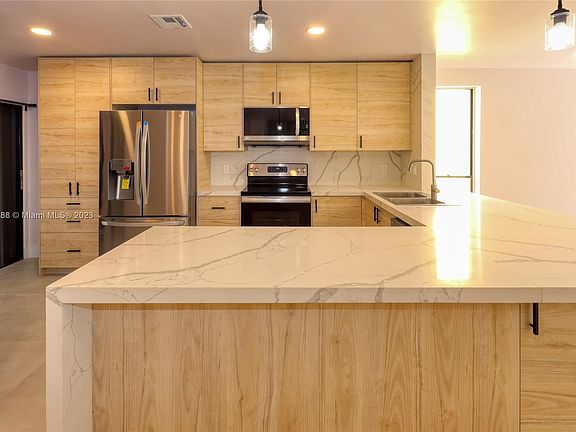 2nd image of 3428 Torremolinos Ave #D-34a