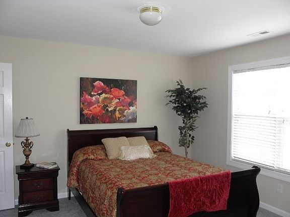 very nice master suite with 2 walk in closets